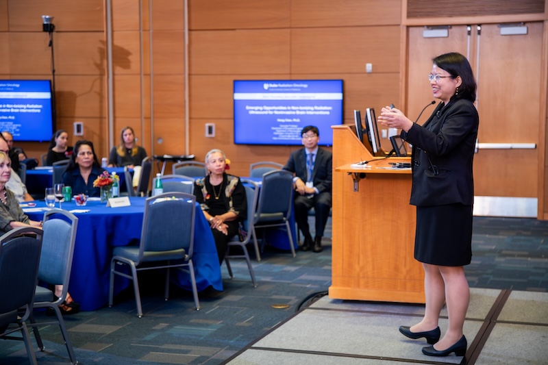 Dr. Chen on stage at the Samulski lecture