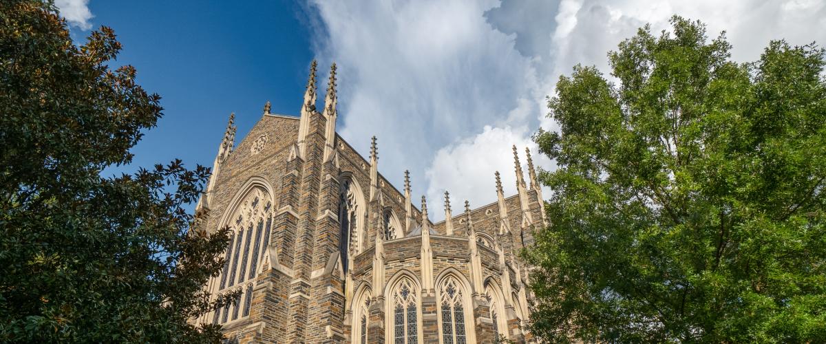 Duke's West campus building surrounded by trees